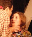 Jake (Chris Neville-Smith) grabbing Flora's neck. What a nice guy.