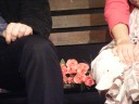 Flowers beween Nicki and Paul on the bench