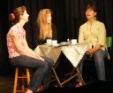 Bella (Heather Prestwich), Geraldine (Amanda Chapman) and Amy (Catherine Racine) finish singing the Mountains of Pomelroy