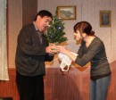 Ilsa gives Arnold his present: a rather feeble Christmas tree.