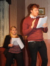 Clem (James Tynan) reads his work. Vivvi (Kayleigh Knox) hasn't a clue what's going on.