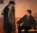 Rex Van Ecks (Brevis) explains alien abductions. Confused? So is Arnold.