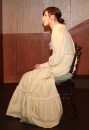 'Then, I noticed Ilsa sit up slightly in her chair, listening intently, as though she alone had heard something, something that had eluded the rest of us.'